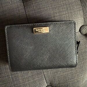 Kate Spade Small Black Saffiano Leather Wallet. Zip pocket and Card Slots